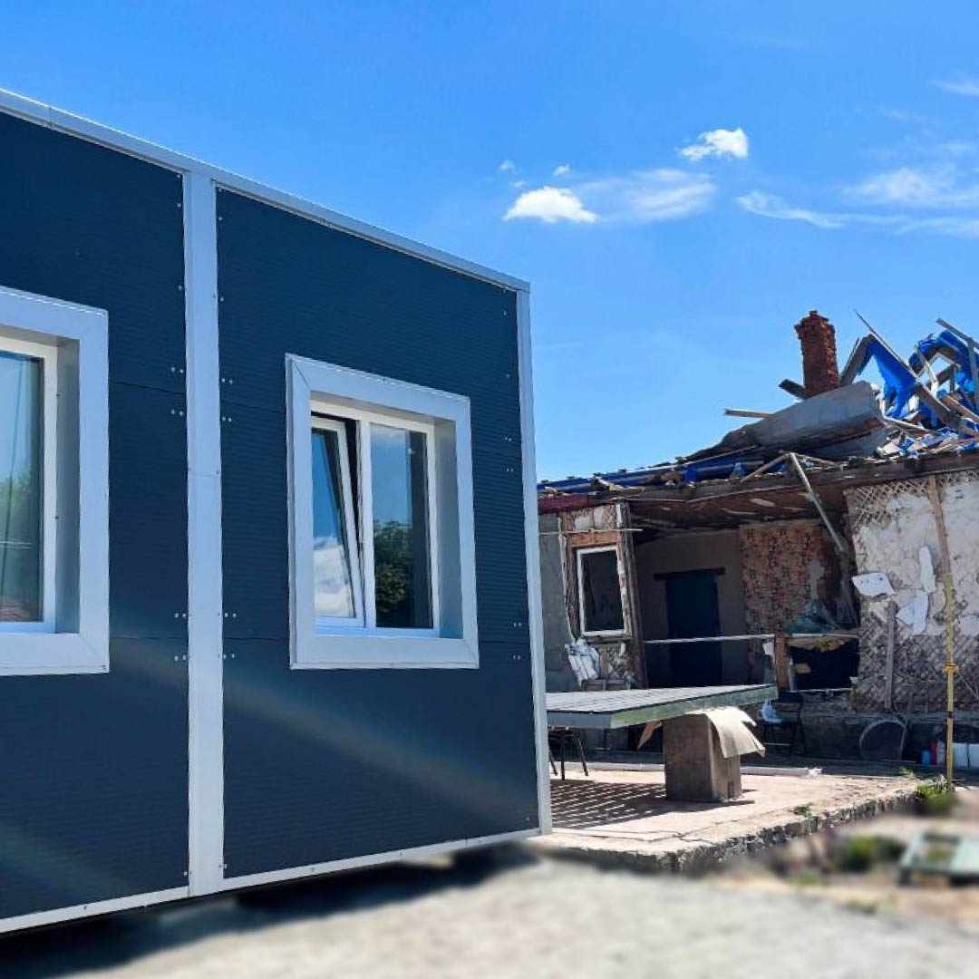 homers social home in Ukraine built next to the wreckage of a Ukrainian home
